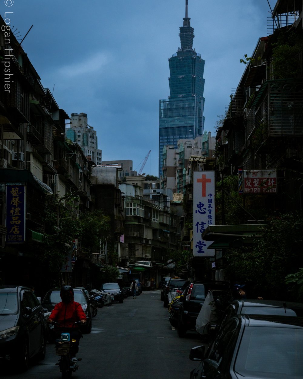 Taipei 101 at the end of a narrow street